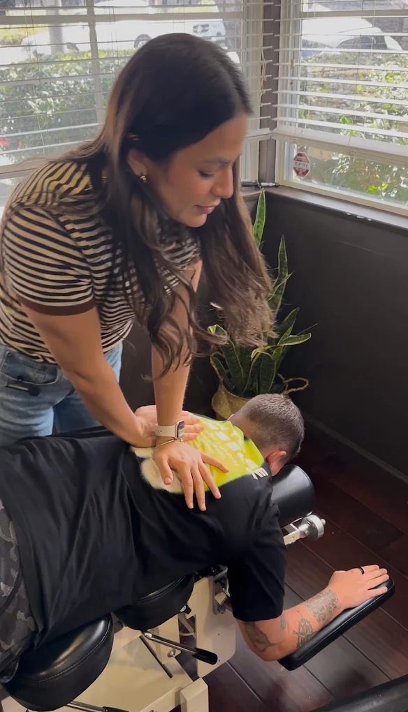 Dr. Verónica Pérez Canabal providing hands-on chiropractic and movement care in La Jolla